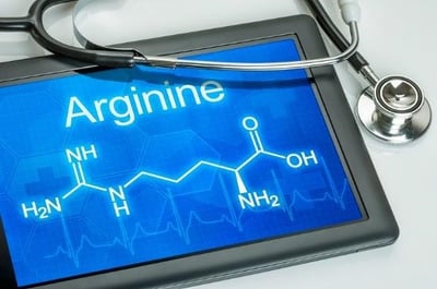 Comprimido com a f&oacute;rmula qu&iacute;mica da arginina